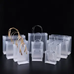 Cheap price waterproof christmas matte pvc transparent packaging bag clear frosted small gift tote handbags