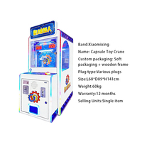 Machine de jeu de vente de bonbons d'intérieur nouvellement conçue Grue à jetons Grue jouet avec fonction amusante en bois de métal en peluche