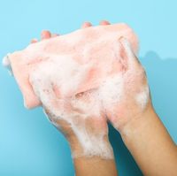 Sac en filet exfoliant pour savon avec cordon de serrage, filet moussant pour douche, corps et visage, séchage rapide, vente en gros, logo personnalisé