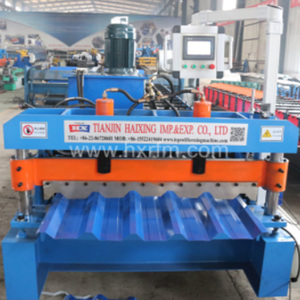 Machine automatique <span class=keywords><strong>de</strong></span> formage <span class=keywords><strong>de</strong></span> rouleaux en <span class=keywords><strong>acier</strong></span> GI PPGI pour la fabrication <span class=keywords><strong>de</strong></span> panneaux muraux <span class=keywords><strong>de</strong></span> <span class=keywords><strong>toiture</strong></span> trapézoïdaux - Product Image 2