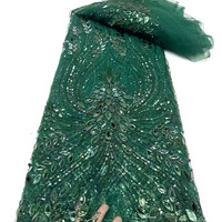 Tissu de dentelle brodée de paillettes de 130cm de large avec des tubes métalliques, des perles de perles et un film d'or pour le matériel de robe de mode