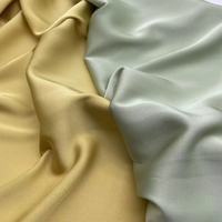 Nouveau design doux sensation de main lisse toucher satin similaire à l'acétate soie duchesse satin matériel tissu pour pyjamas