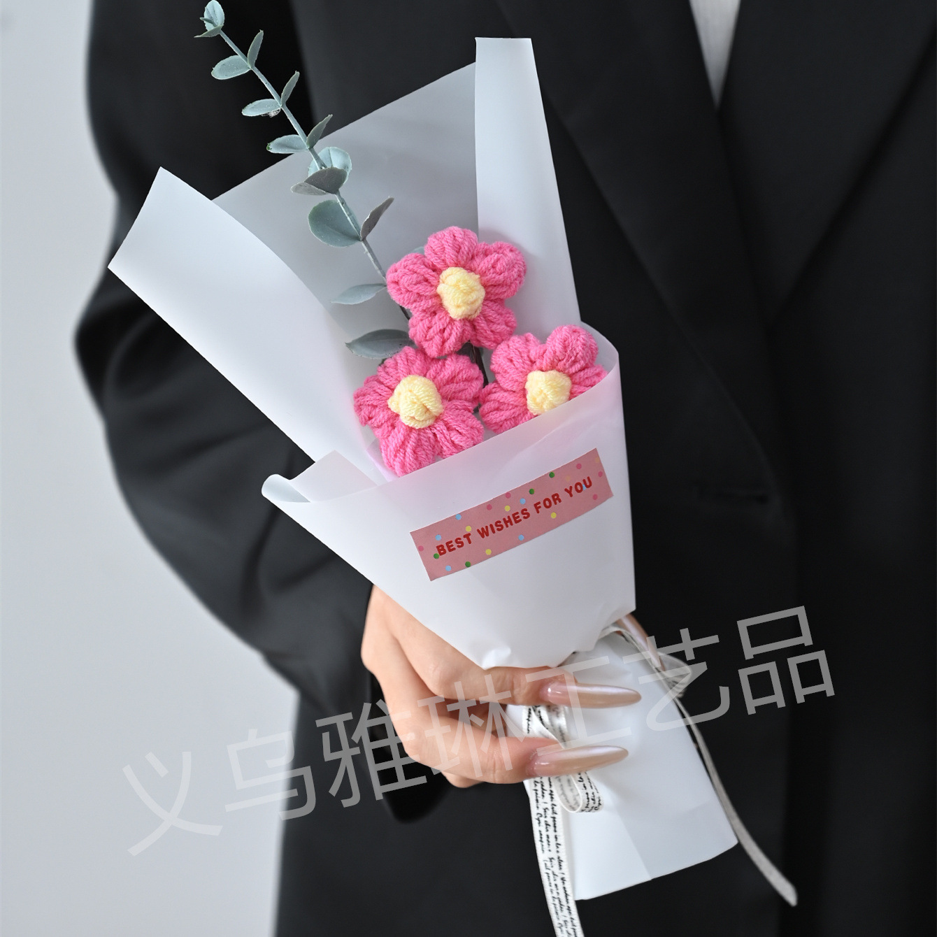 Three pink flowers on white paper