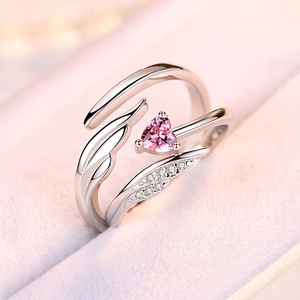 Moda europea y americana alas de Ángel anillo de pareja abierto hombres y mujeres anillo de bodas de plumas de circón - Product Image 2