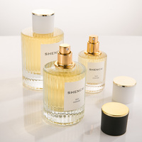 Flacon de parfum cylindrique de luxe personnalisé 30ml 50ml avec étiquette, logo personnalisé, pompe pulvérisatrice à vis, bouteille en verre vide avec bouchon