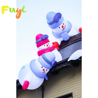 Décoration de Noël géante gonflable personnalisée Fuyi pour toit et affichage commercial
