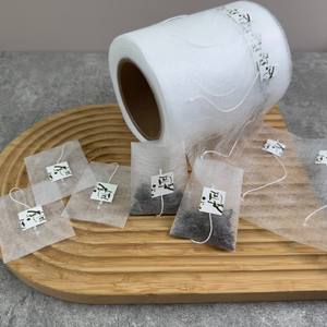 Pyram de thé biodégradable fabriqué à partir de matériau non tissé en PLA pour rouleau de sachet de thé avec ficelle et étiquette - Product Image 1