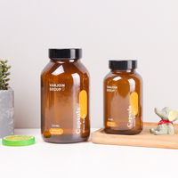 Bouteilles de capsules pharmaceutiques en gros 100 ml 200 ml 250 ml Bouteille en verre pour vitamines Couleur dégradée OEM Capsule cosmétique Complément alimentaire