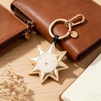 Breloque de sac en cuir PU, mignon visage souriant, porte-clés personnalisé, pendentif soleil doré pour sacs à main, cadeaux pour femmes