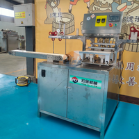 Scellant de tofu en boîte commercial HJ-Machine d'emballage de boîtes de tofu à haute productivité 220V 500W avec dimensions personnalisables
