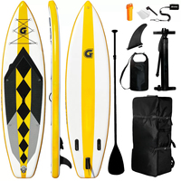 Planche de surf gonflable portable en PVC pour la pratique du surf en mer. Planche