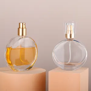 OEM özel Logo boş lüks doldurulabilir düz Botol parfüm sis sprey 50Ml 30Ml şeffaf cam yuvarlak parfüm şişesi