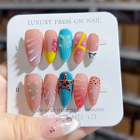 Faux ongles ABS Materia à presser Design d'amande à la main 10 pièces modèle à la mode sculpture de fleurs personnalisée