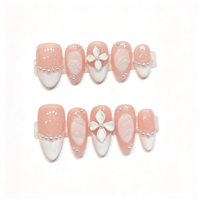 Ongles courts en amande faits à la main, couleur abricot nude, fleurs sculptées en 3D, perles, ongles de mariage style Soft Girl, vente en gros