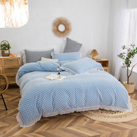 Nouvel ensemble de literie trois dimensions bicolore quatre pièces avec housse de couette en dentelle, jupe de lit et drap, personnalisable en polyester et coton