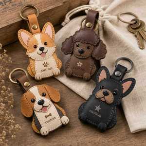 Porte-clés en cuir PU haut de gamme gravé sur mesure avec pendentif mignon et amusant en forme de chien Corgi ou Caniche, idéal pour les cadeaux et la promotion en animalerie - Product Image 1