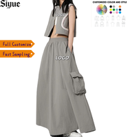 Ensemble sportif streetwear techwear 2 pièces pour femme Y2K : gilet court zippé + jupe longue cargo en maille unie à taille élastique