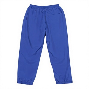 Pantalon de survêtement large personnalisé en tissu respirant pour homme, coupe décontractée avec poches, prêt pour commande en gros par usine OEM - Product Image 1