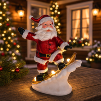Figurine de Père Noël éclairée en ski, décoration de table de Noël, ornement de Père Noël sur snowboard pour la décoration de fête à la maison