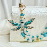 Breloque de téléphone perlée fleur bleue, cordon de poignet double couche pour téléphone, perles imitation nacre, porte-clés fait main, pendentif de sac, décoration