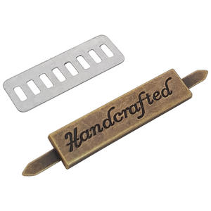 Bolso de mano <span class=keywords><strong>con</strong></span> logotipo metálico grabado personalizado Midea, bolso <span class=keywords><strong>con</strong></span> placa de marca, logotipo metálico, tela de herrajes, logotipo metálico para <span class=keywords><strong>camisetas</strong></span>, bolsos de mano, natación - Product Image 5