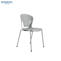 Chaise en plastique empilable grise moderne avec dossier découpé en feuilles