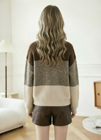 Pull en tricot colorblock confortable - Coupe ample et décontractée, texture douce et rayures tendance pour un look chic automne/hiver.