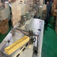 Machine d'emballage de barres chocolatées longues en aluminium avec scellage thermique, haute production, entièrement automatique, personnalisable