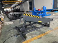 Plateforme élévatrice hydraulique de chargement et de déchargement de conteneurs hydrauliques stationnaires