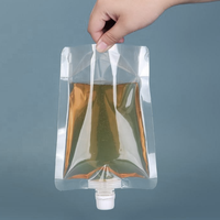 Vente en gros de sachets à bec verseur en PET/PA/PE de qualité alimentaire, biodégradables et recyclables, transparents, de 500 ml à 2 L, pour le lait, avec bec verseur liquide transparent