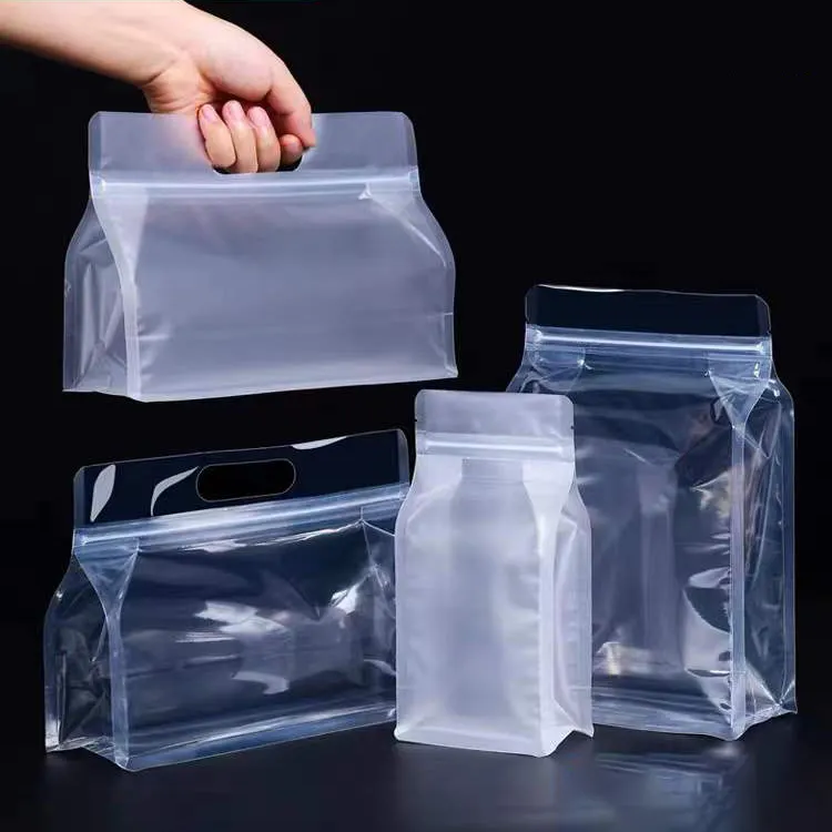 Sacos plásticos transparentes de fundo plano quadrado de bloco