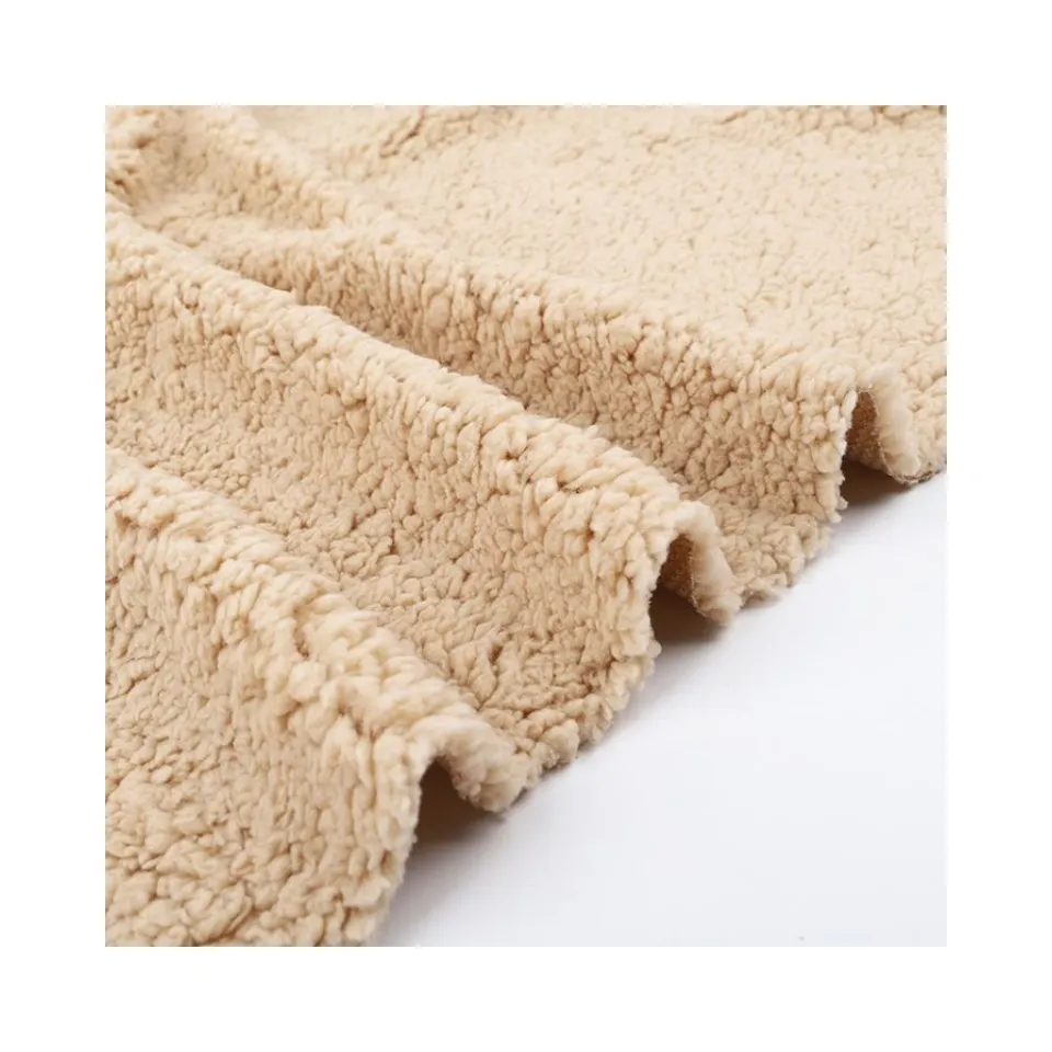 Shaoxing fabbrica di alta qualità 100% poliestere personalizzato imitare cotone lana di agnello tessuto in pile Sherpa per abbigliamento