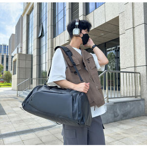 Popular Bolso de Lona Tipo Duffle para Hombre con Logo Personalizado, Mochila de Mensajero Impermeable para Fin de Semana, Gimnasio y Viaje con Compartimento para Ropa Húmeda - Product Image 5