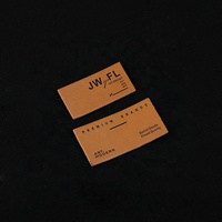 Étiquettes en cuir PU prix d'usine logo en relief personnalisé lavable vêtement véritable réparation patchs en cuir pour jean vente en gros