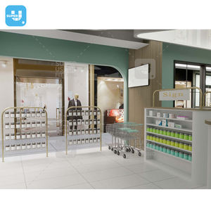 Tienda médica Diseño de muebles Soporte de exhibición de farmacia Góndola Metal dorado Vidrio templado Farmacia Estante de exhibición con mostrador - Product Image 1