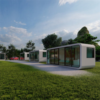 Maison Capsule Préfabriquée de Luxe en Acier Moderne de 20/40 pieds, 2 Chambres, Style Apple, avec Panneaux Solaires et Espace Multifonctionnel