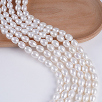 Chaîne de perles d'eau douce en gros, 9-10 mm, perles de riz blanches, bonne qualité pour la fabrication de colliers
