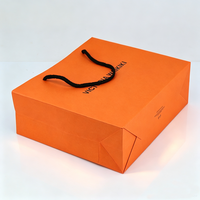 Emballages de bijoux de haute qualité pour boutiques, sacs cadeaux personnalisés pour bracelets, boucles d'oreilles, colliers, bagues, sacs en papier parfumé orange