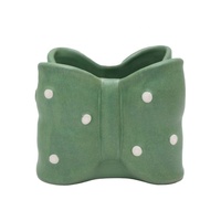 Vente en gros de pots à fleurs en céramique rose moderne et écologique à pois avec nœud papillon, joli pot de fleurs de table, OEM/ODM