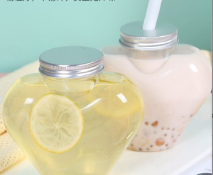 Venta al por mayor, 300ml, 400ml, 500ml, botella <span class=keywords><strong>en</strong></span> forma de corazón de <span class=keywords><strong>amor</strong></span>, botella de jugo de PET, botella de bebidas de agua vacía con tapas para negocios - Product Image 3