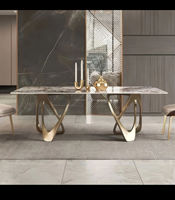 Ensemble de table à manger en marbre gris moderne avec pieds en acier inoxydable chromé pour hôtel ou villa avec chaise de salle à manger