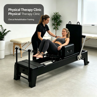 Reformer Pilates en chêne finition noire moderne avec accessoires complets pour l'entraînement Pilates à domicile et commercial