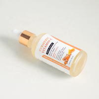 Sérum de soin de la peau pour le visage Essence de curcuma éclaircissant à la vitamine C Taches brunes Sérum végétalien pour le visage Soins de la peau bio de marque privée