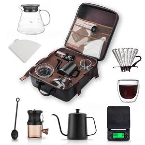 Ensemble d'ustensiles de voyage modernes <span class=keywords><strong>en</strong></span> céramique avec combinaison de tasses filtrantes meulage à la <span class=keywords><strong>main</strong></span> cafetière tasses à thé et soucoupes - Product Image 1