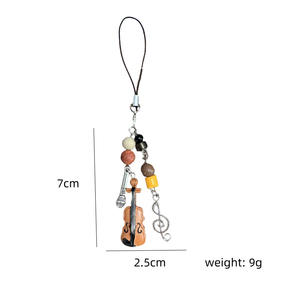 هدايا ترويجية: حلقات مفاتيح على شكل ميكروفون وكمان، زينة معدنية للهواتف والحقائب، سلاسل مفاتيح موسيقية - Product Image 5