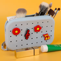 Petit porte-monnaie ovale en silicone à la mode nouveau sac cosmétique décoratif bricolage avec fermeture à glissière et trou décoratif