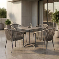 Ensemble de salle à manger d'extérieur moderne et confortable, résistant aux intempéries, avec chaises en rotin PE tressé et table carrée en pierre frittée à structure en aluminium