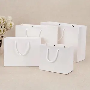 Bolsa de papel de compras con asas para manualidades de regalo Kraft marrón blanco con impresión personalizada de su propio logotipo