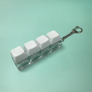   Llavero de juguete para aliviar el estrés con 4 llaves, herramienta de descompresión unisex de plástico rosa para adultos y niños - Product Image 3