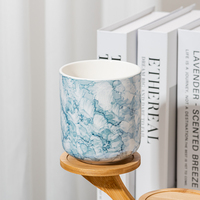 Pot à bougie en céramique élégant à motif de marbre bleu